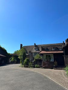 an empty street in front of a house at Ferme Mellon in Niederbronn-les-Bains