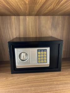 a microwave oven sitting on top of a table at اورا بلس AURA PALACe in Taif