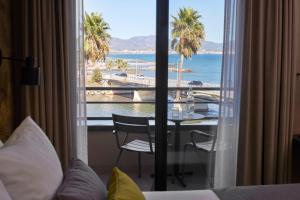 a hotel room with a view of the ocean at Van der Valk Hotel Saint-Aygulf in Saint-Aygulf