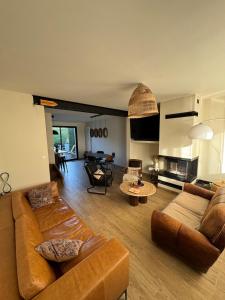 a living room with a couch and a table at Reve dOpale in Étaples