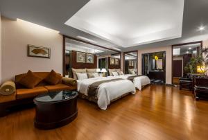 Letto o letti in una camera di Chuang-Tang Spring SPA Hotel - Deyang