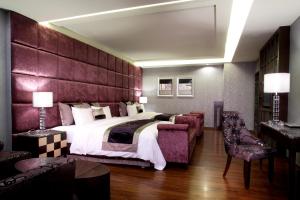 Letto o letti in una camera di Chuang-Tang Spring SPA Hotel - Deyang