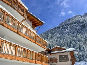 a view from the balcony of a hotel in the mountains at A Casa Saphir Appartement-Hotel in Sölden