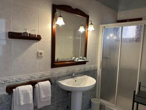 a bathroom with a sink and a shower at Can Genis Turismo Rural in Peralada +43 photos