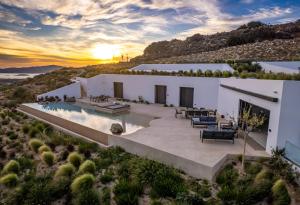 an aerial view of a house with a swimming pool at Skylines Estate Paros in Kampos Paros