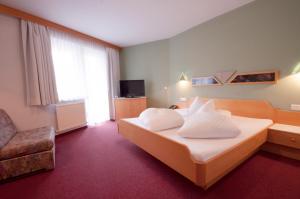 TV in/ali zabaviščno središče v nastanitvi Hotel Alpenfriede