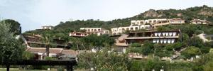 a group of houses on top of a mountain at Is Molas Domus Michela in Is Molas 