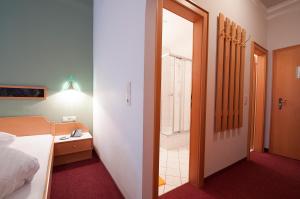 Postelja oz. postelje v sobi nastanitve Hotel Alpenfriede