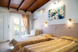 Posteľ alebo postele v izbe v ubytovaní Studio Nikos + 37 fotografií