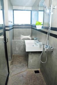 a bathroom with a sink and a shower at Sky Haven in Matara