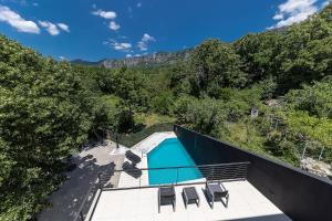 an overhead view of a swimming pool on a house at Villa Arija in Grižane