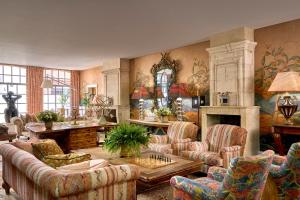 a living room with couches and a chessboard at The Soho Hotel, Firmdale Hotels in London
