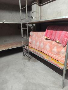 a couple of bunk beds in a room at dormatery rooms in Jāmb