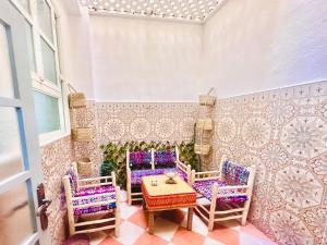 a room with a table and two chairs and a table and chairs at Apartment with 2 bedrooms in Essaouira