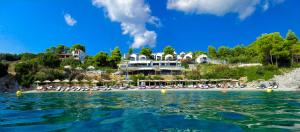 a view of a resort from the water at Adrina Resort & Spa in Panormos Skopelos