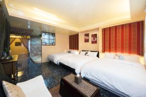 A bed or beds in a room at Blissful Star