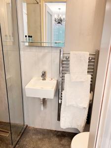 a bathroom with a sink and a mirror at Old Town Retreat in Rhodes Town +65 photos
