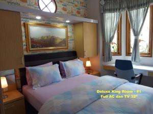 Кровать или кровати в номере Nariska Suite Homestay
