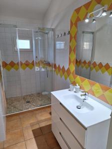 a bathroom with a sink and a shower at FINCA ALEGRANZA in Torrelavega +16 photos