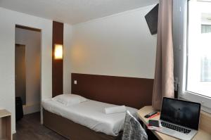 Postel nebo postele na pokoji v ubytování B Hotel Caen Mondeville