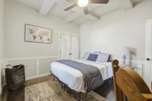 a bedroom with a bed and a ceiling fan at The Palo in Alamogordo