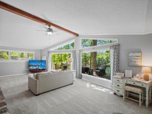 a living room with a couch and a table at Sheltered Cove - Family-Friendly With Lots Of Options! in Jasper