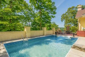 a swimming pool in the backyard of a home at Yellowhammer Hill - Amenities Galore! Near Cullman in Cullman
