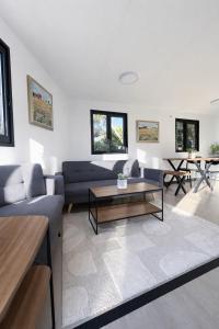 a living room with a couch and a table at Finca Feliciano in Novo Sancti Petri