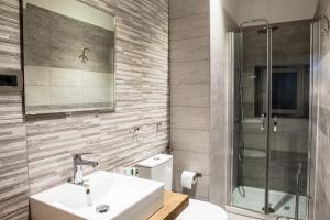 Koupelna v ubytování Venere Rooms + 29 fotografií