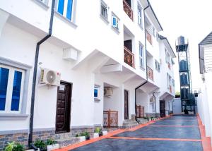 a street in front of a building at Riverside Nest Owerri Ltd in Owerri