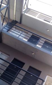 an empty room with several windows on the ceiling at Edificio San Jose in Federación +3 photos