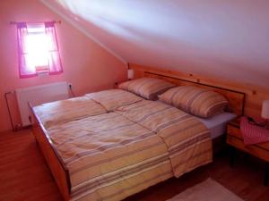 Postel nebo postele na pokoji v ubytování Tourist farm Samec