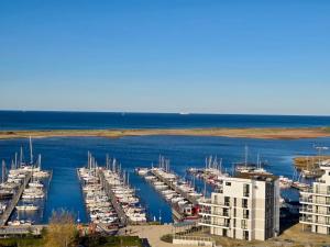 a group of boats docked in a marina at Fewo GüNi Ostseeblick Wendtorf Marina Strand in Wendtorf
