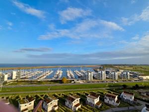 an aerial view of a city with a marina at Fewo GüNi Ostseeblick Wendtorf Marina Strand in Wendtorf