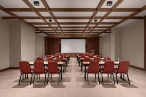 a conference room with tables and chairs and a whiteboard at Ceylan Splend'or Uludag, Autograph Collection in Uludar +109 photos