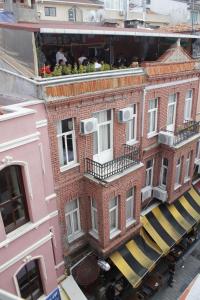 an overhead view of a brick building with a balcony at Puffin Boutique - Istanbul in Istanbul