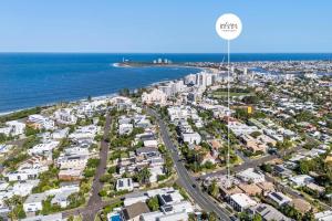 an aerial view of a city and the ocean at Sunshine Hideaway - Easy Beachside Living in Mooloolaba