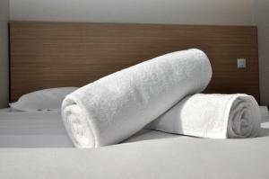 Postel nebo postele na pokoji v ubytování B Hotel Caen Mondeville