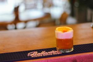 a drink sitting on top of a table at Capybara Hostel - Boutique hostel in Villavicencio +17 photos