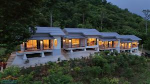 an aerial view of a house with lights at Greenery Hill in Ban Nok