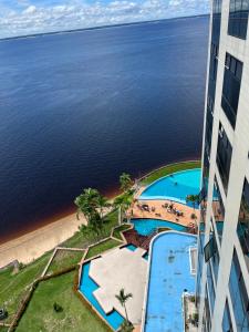 an aerial view of the ocean from a building at Flat Tropical Hotel Com Varanda Vista Espetacular in Manaus