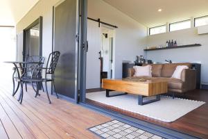 a living room with a couch and a coffee table at Buller Wines in Rutherglen +35 photos