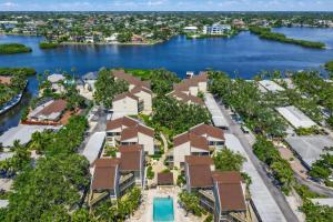 an aerial view of aominium complex with a body of water at Siesta Key Beach - 2 Bedroom - 3 Beds - 3 Bathroom Duplex with Heated Swimming Pool in Siesta Key