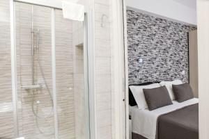 Postel nebo postele na pokoji v ubytování Venere Rooms