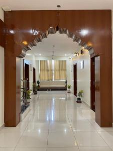 an empty lobby with a large hallway in a building at New Crown Plaza in Jodhpur