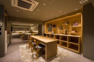 a kitchen and dining room with a table and chairs at Sumu Ueno East in Tokyo +33 photos