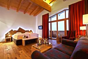 Łóżko lub łóżka w pokoju w obiekcie Hotel Seelos