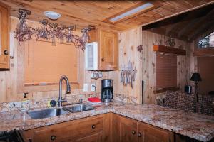 a kitchen with a sink and a counter top at Near Ski, Beaches, Pet Friendly, Full kitchen in South Lake Tahoe +21 photos