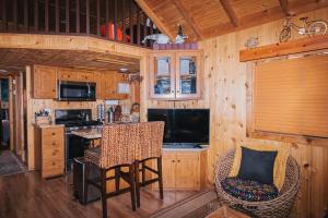 a kitchen with a table and chairs in a cabin at Near Ski, Beaches, Pet Friendly, Full kitchen in South Lake Tahoe