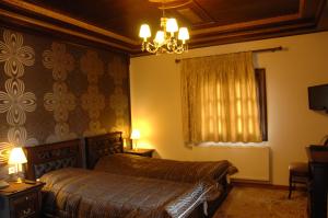 Postel nebo postele na pokoji v ubytování Guesthouse Iridanos